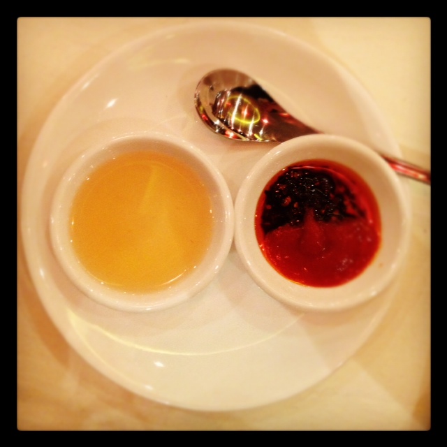 Some kind of vinegar and chilli sauce with chilli oil. Kaboom.