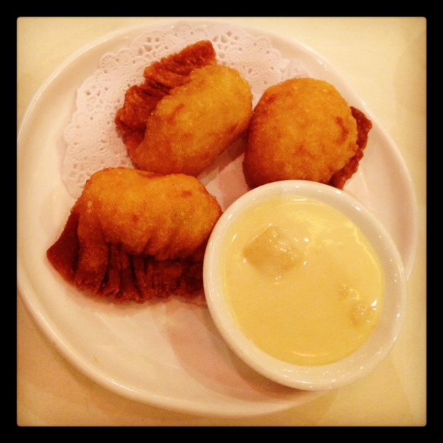 Deep fried prawn dumplings with salad sauce