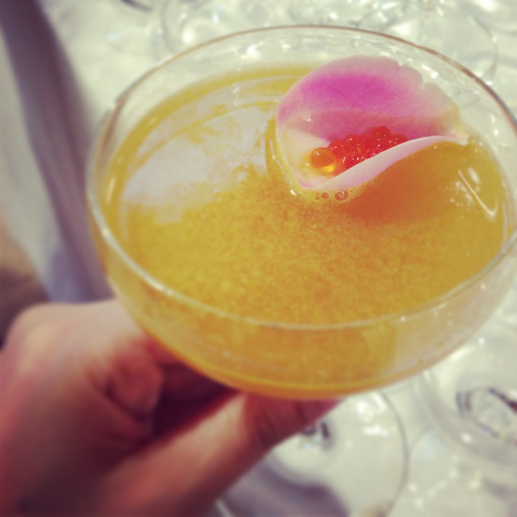 Clementine and rose cocktails with fruit caviar