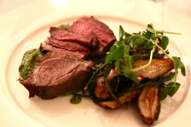 Pomegranate glazed lamb rump, Jerusalem artichokes, pea and caper relish