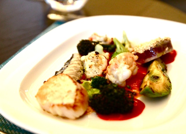 Seafood salad, tomato coulis, salmoriglio vinaigrette
