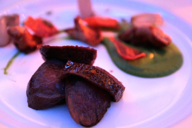 Cannon of lamb with pea puree and caramelised shallots