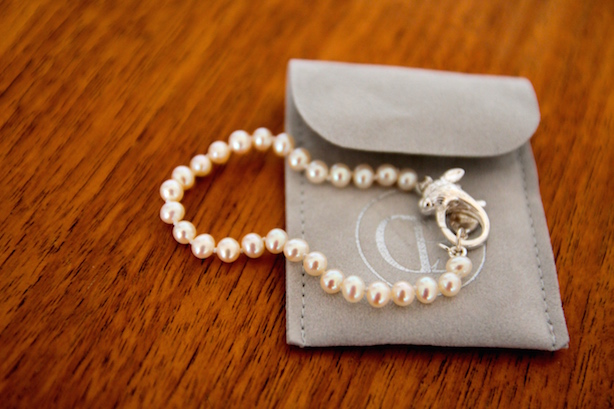 Claudia Bradby Alice in Wonderland pearl bracelet