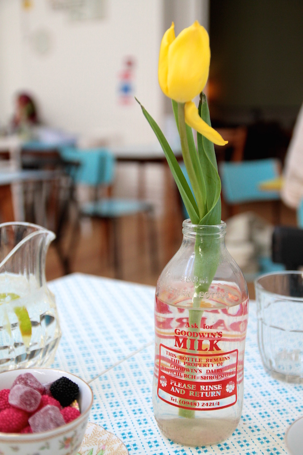 Tulips in a milk bottle