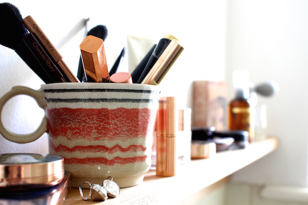 Makeup on bathroom shelf